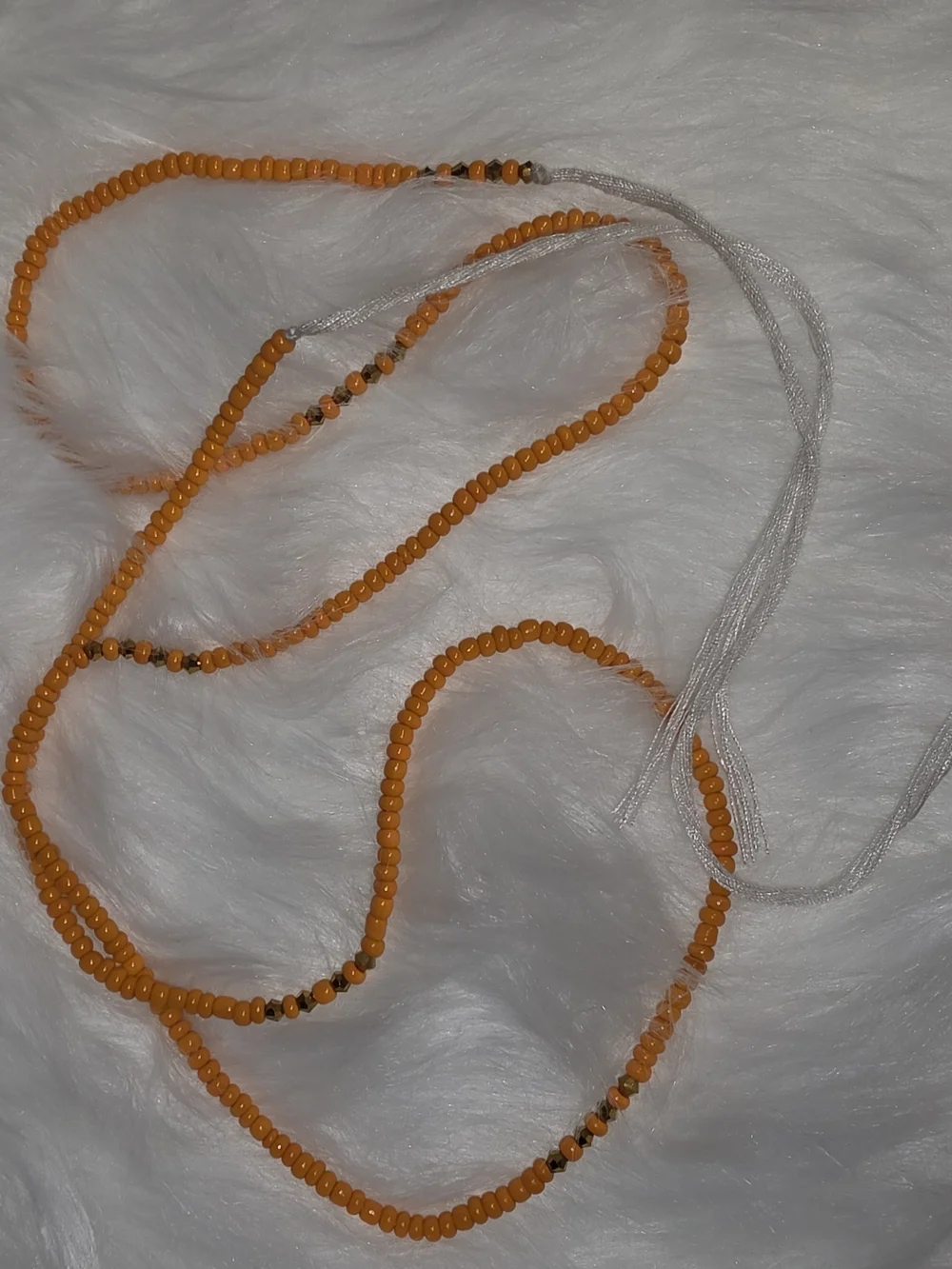Handcrafted Orange Beaded Hair Wrap with Tassel Accent